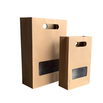 Bolsa de papel kraft con asa y ventanilla. Material cartoncillo duro